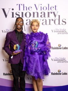 Terrell Green alongside a fellow award winner at 2025 Violet Visionary Awards Ceremony.